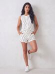 White With Black Sleeveless Polka Dot Buttoned Top And Shorts Set
