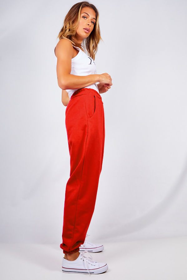 red oversized joggers