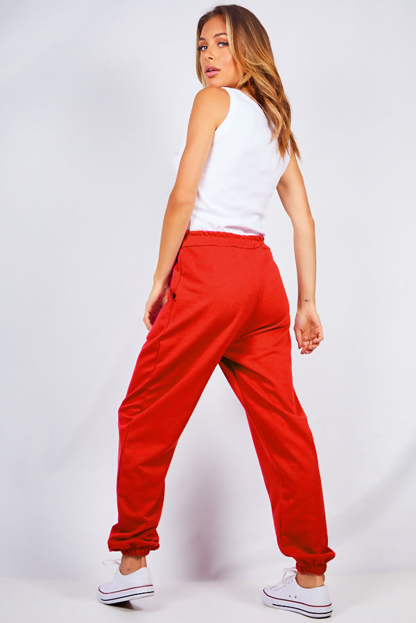 red oversized joggers